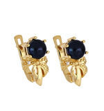 Black Pearl and White Topaz Gold Stud earring